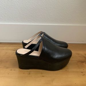 Brand new black slip-on platforms size 8 fit like 7